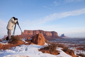 Photographers working in winter at dawn