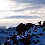 Photographers working in winter at dawn